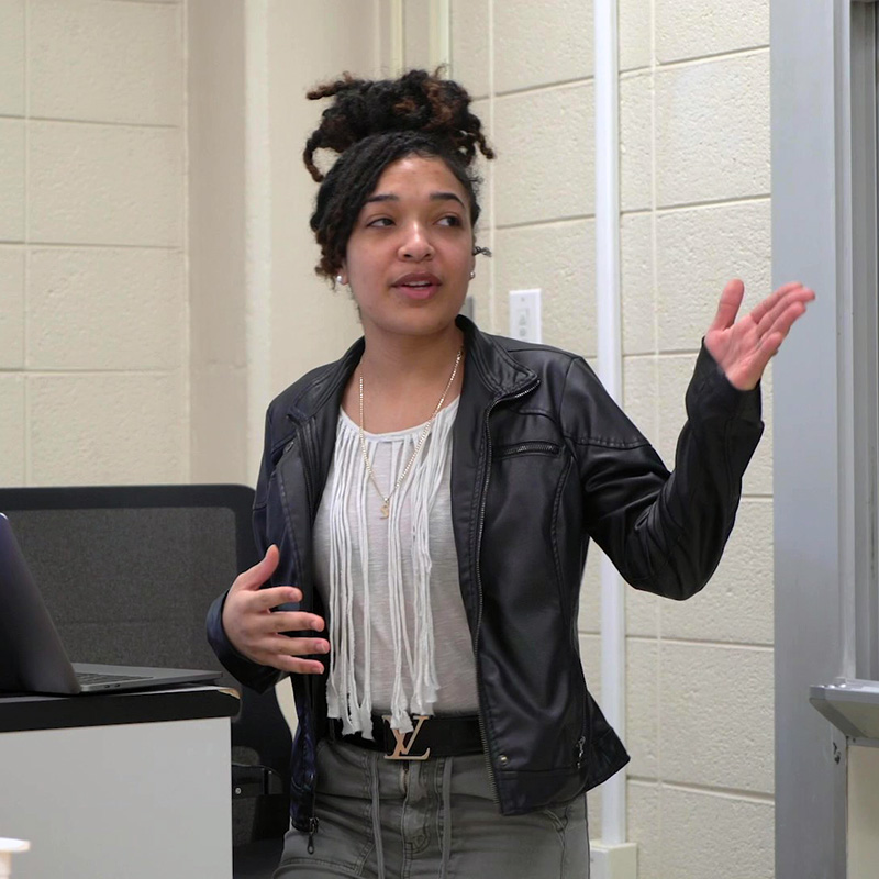 Woman teaching sociology class